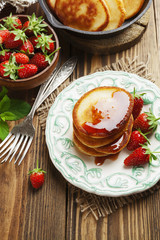 Homemade pancake with strawberry jam