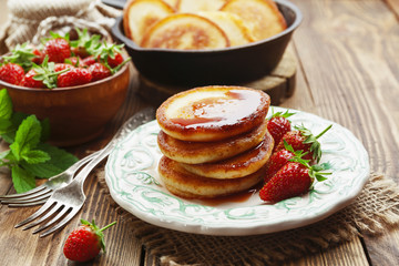 Homemade pancake with strawberry jam