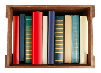 Books in wooden box, top view