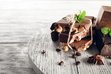 Set of spicy chocolate on wooden background