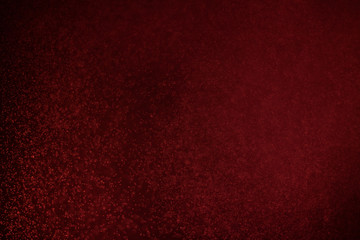 abstract dark bokhe lights background , red ,black and subtle gold. defocused background