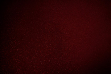 abstract dark bokhe lights background , rede,black and subtle gold. defocused background