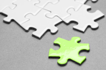 Jigsaw puzzle, business concept, leader, team & difference