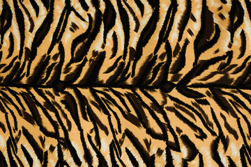Texture fabric of tiger for background