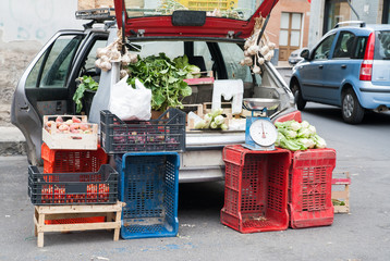 Characteristic arrangement of fruit boxes in a street seller's car