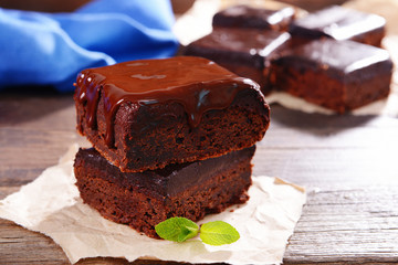 Delicious chocolate cakes on table close-up