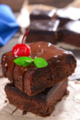 Delicious chocolate cakes on table close-up