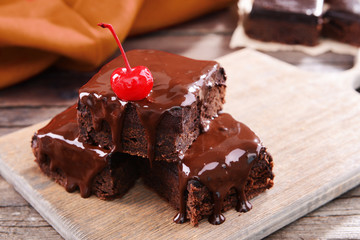 Delicious chocolate cakes on table close-up