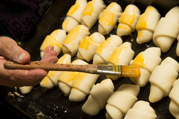 Unbaked bake rolls with brush