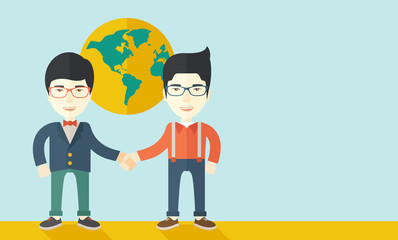 Two chinese guys happily handshaking.