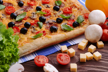 Delicious homemade pizza on table close-up