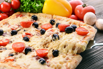 Delicious homemade pizza on table close-up