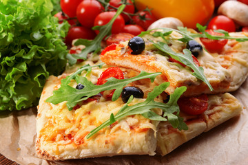 Delicious homemade pizza on table close-up