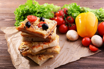 Delicious homemade pizza on table close-up
