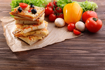 Delicious homemade pizza on table close-up