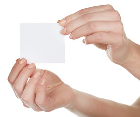 Hands holding blank card isolated on white