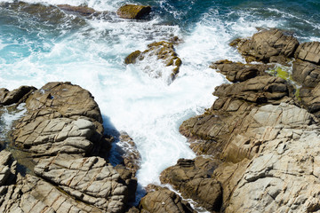 Sea rocks and waves