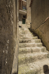 Pisciotta, Cilento, Italy. Small medieval village. Small squares, streets, stairways, Mediterranean colors, stone, bricks, doors and portals. Sky, sun and sea. 