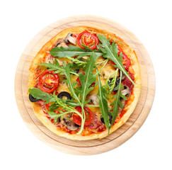 Tasty pizza with vegetables and arugula on cutting board isolated on white