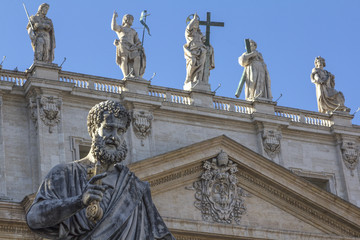 Fototapeta na wymiar Statue of Saint Peter in front of basilica in Vatican, Italy