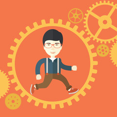 Japanese man running inside a gear.