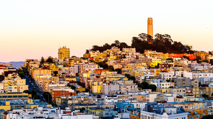 Coit tower and houses on the hill san francisco at dusk