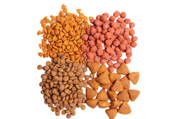 Dry dog food close up, isolated on white background