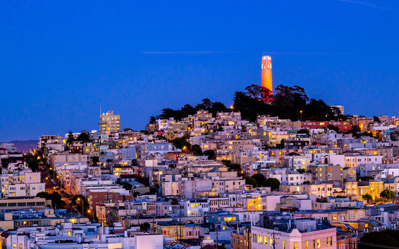 Coit Tower And Houses On The Hill San Francisco At Night