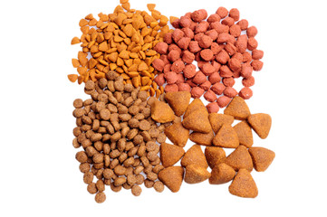 Dry dog food close up, isolated on white background