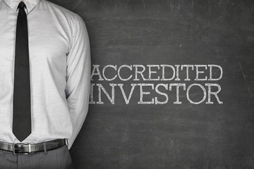 Accredited investor text on blackboard