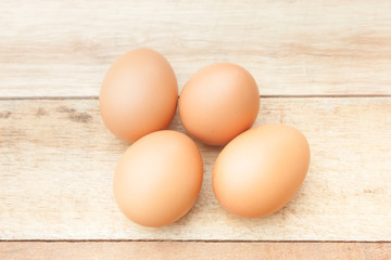 Eggs on wood background