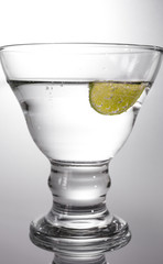 Lemon bubble float in the water in the transparent grass