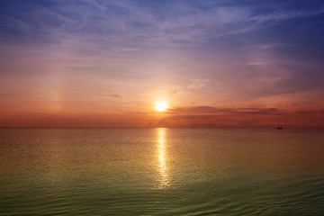 Fototapeta na wymiar Sunset on the beach at Hua Hin, Thailand.