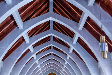 Lights and Arches Under Church Roof