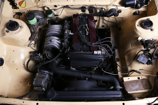 Parts under the hood of car