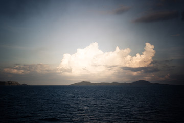 Blue sky with clouds over sea. Nature composition.