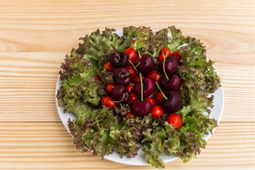 Tomato , salad on the wood background