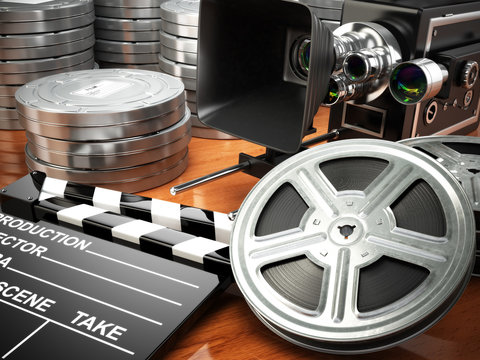 Video, movie, cinema vintage concept. Retro camera, reels and cl