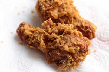 Fried chicken drumstick on napkin