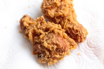 Fried chicken drumstick on napkin