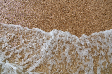 Wave on the sand
