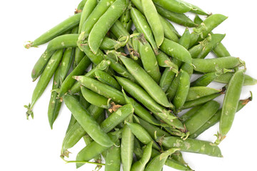 Big pile of green pea pods on a white background
