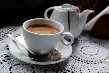 Badkamer foto achterwand Hot chocolate in mug, on table, on dark background © Africa Studio