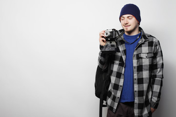 young  photographer over white background