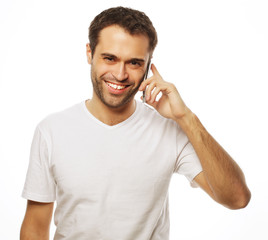  man in shirt speaking on the phone