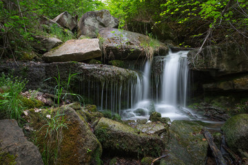 Fototapeta na wymiar Waterfall in forest