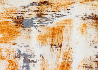 A background of peeling paint and rusty old metal
