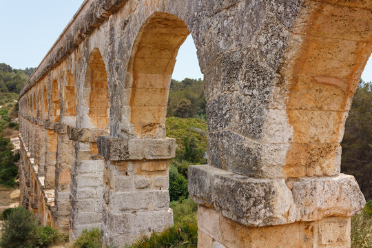 Ancient Roman aqueduct Devil's bridge in Catalonia, Spain.
