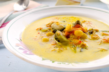 corn soup with brussels sprouts and other vegetables