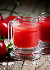 Tomato juice in old-fashioned mug, selective focus